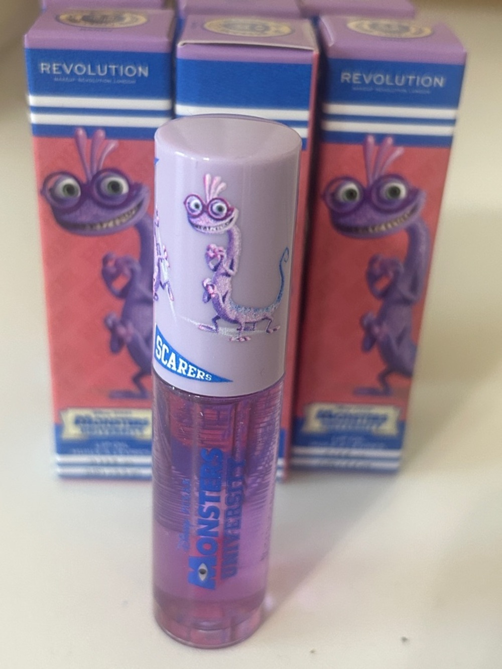 Revolution Monsters Lip Gloss - Lilac Cap with Purple Tube 6pcs. New in Box